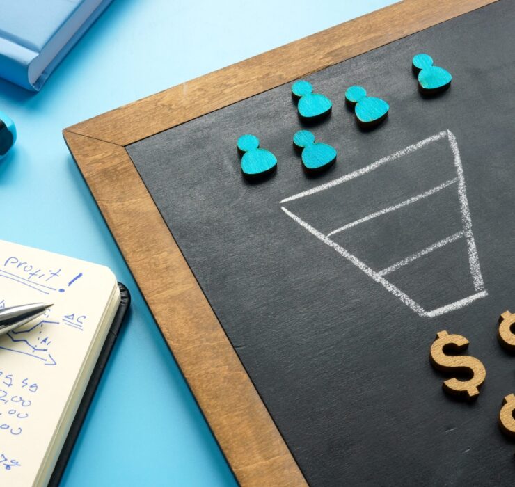 Marketing,Sales,Funnel,On,The,Blackboard,And,Figurines.