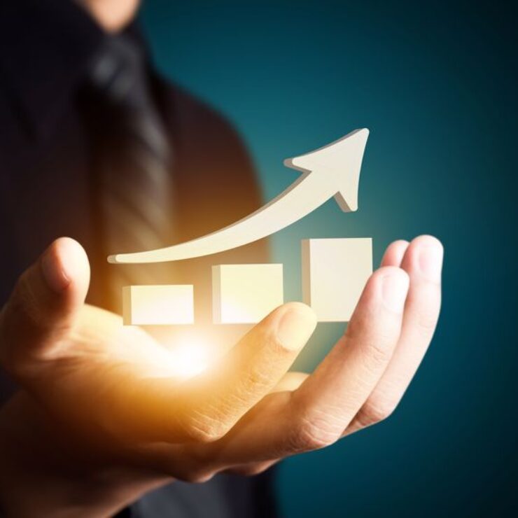 Hand,Holding,A,Rising,Arrow,,Representing,Business,Growth.