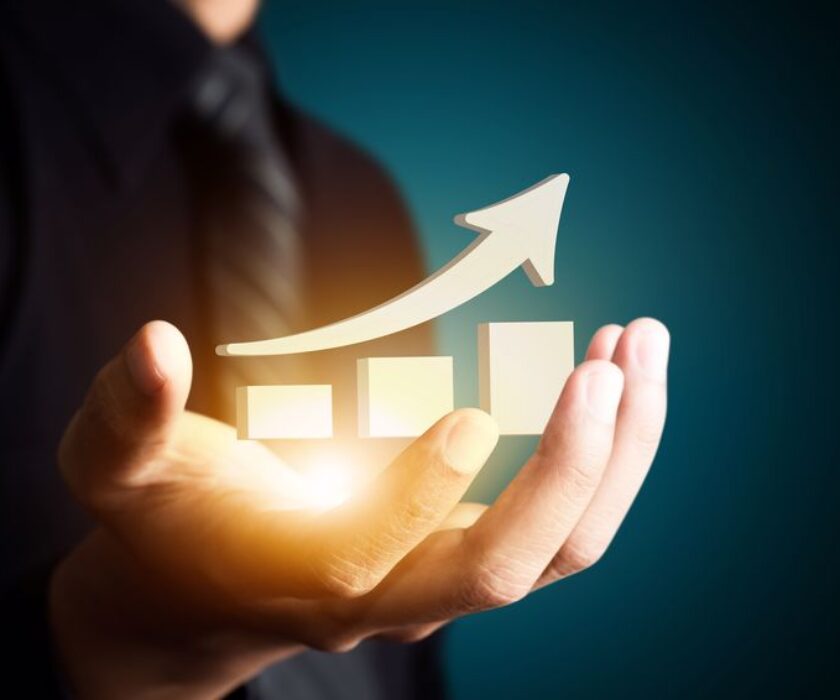 Hand,Holding,A,Rising,Arrow,,Representing,Business,Growth.