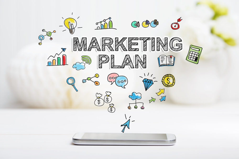 Marketing,Plan,Concept,With,Smartphone,On,White,Table